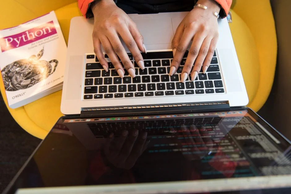 A laptop showing an online checkout form, emphasizing technology and e-commerce.